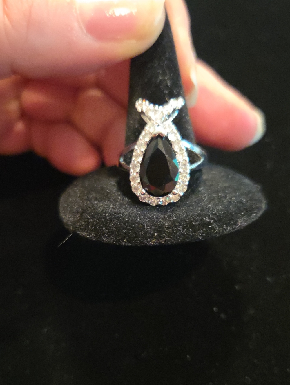 SILVERTONE RING WITH BLACK FACETED STONE AND RHINESTONE ACCENTS